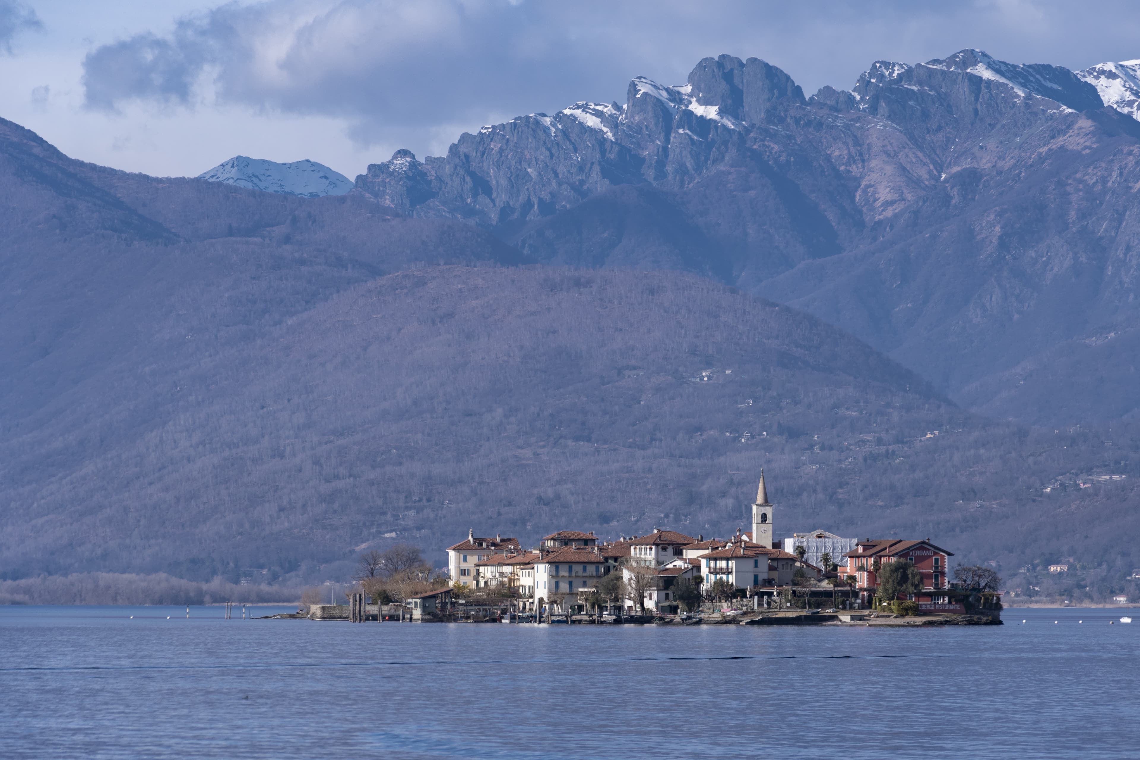 Lake Maggiore shoreline and mountains seen from the water